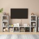 3-cube bookshelf in white with back guardrail, featuring ample storage for books and decorative items in a living room.