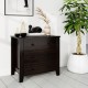 Wide dark brown 3-drawer dresser with smooth metal slides, perfect for organizing books and accessories in modern.