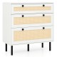 Close-up of the rattan texture on the front of a 3-drawer nightstand in white, enhancing boho style and decor.