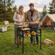 Folding picnic table with adjustable height, large storage net, and durable mesh tabletop for camping and grilling.