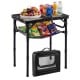 Folding picnic table in black with large storage net, adjustable height, and snacks displayed for outdoor gatherings.