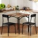 Square kitchen table set with rustic brown veneer and two black PU leather chairs for dining room use.