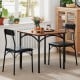 Square dining table set with rustic brown veneer and two black PU leather chairs, perfect for cozy dining rooms.