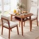 3-piece dining table set with cherry finish, upholstered chairs, and built-in storage, perfect for small spaces.