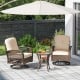 Patio swivel rocker set with thick cushions and tempered glass side table, perfect for backyard relaxation.