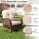 Cozy patio swivel rocker with tufted back cushions and zippered covers, perfect for backyard relaxation.
