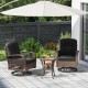 Patio swivel rocker set featuring black cushions and a tempered glass side table, perfect for backyard relaxation.
