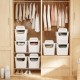 Stackable white plastic storage bins with front doors and side handles, ideal for versatile home organization.