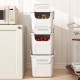 Three stackable white plastic storage bins featuring front flap doors and side handles for easy access and organization.