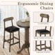 Wood bar table set with round pedestal base and two ergonomic stools featuring padded seats and curved backs for.