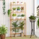 3-tier bamboo bathroom organizer with adjustable shelves, hooks, and plants, perfect for flexible storage and decor.
