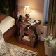 3-tier cherry end table with charging station, curved design, and open storage shelves for living room or bedroom use.