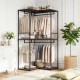 3-tier heavy duty clothes rack in black with hanging rods and wood-grain shelves for stylish storage in modern spaces.