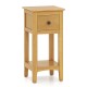 Natural 3-tier nightstand with a drawer and open shelf, perfect for cozy corners in living rooms or bedrooms.