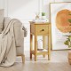 Natural wood 3-tier nightstand with drawer and open shelf, ideal for living room or bedroom storage and display.