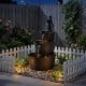 Three-tier outdoor barrel waterfall fountain with vintage bronze finish and electric pump for a relaxing garden ambiance.