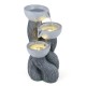 Three-tier outdoor water fountain with LED lights, resin construction, and cascading design for patio relaxation.
