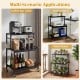 3-tier black rolling microwave cart with power outlet, lockable wheels, and 10 hooks for versatile kitchen organization.