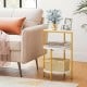 3-tier round end table with gold metal frame and white shelves, ideal for small spaces and bedroom organization.