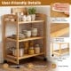 3-tier bamboo utility cart with easy-clean surface, adjustable shelves, and 4 wheels for versatile storage in any room.