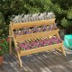 Wooden vertical raised garden bed with three tiers and a storage shelf, featuring a compact design for efficient.