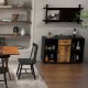Industrial sideboard with Windsor chairs and wall-mounted wine rack, featuring rustic finishes for stylish dining.