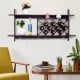 Wall-mounted wine rack with space for 10 bottles and 3 glasses, featuring an industrial chic design for stylish storage.