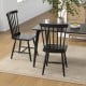 Windsor chairs and industrial sideboard in black, perfect for dining or storage in a stylish home setting.
