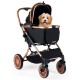 Foldable pet stroller in black with sun shade, safety belt, and a small dog inside, suitable for up to 55 lbs pets.