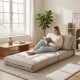 Beige 3-in-1 folding sofa with bolster, convertible to a bed, ideal for living rooms and guest rooms.