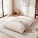 Large beige bean bag chair with soft corduroy fabric, perfect for lounging, reading, or entertaining in any room.