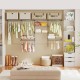 Closet organizer system with 7 shelves and 5 hanging rods in grey, ideal for laundry or bedroom storage solutions.
