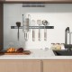 18-inch black magnetic tool holder strip with kitchen utensils, showcasing strong magnetic hold and sleek design for.