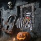 Hanging 18-inch animated skull prisoner decoration with LED eyes and sound effects for immersive Halloween scares.