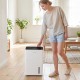 The 4000 Sq.Ft 80 Pint Dehumidifier features an intuitive control panel and is ideal for home use in various rooms.
