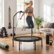 Fitness trampoline with adjustable handlebar, resistance bands, and a sturdy frame for indoor workouts and balance improvement.