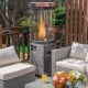 Propane patio heater with tempered glass and lockable wheels, providing warmth and style for outdoor gatherings.