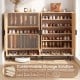 43-inch tall shoe cabinet with double doors, featuring adjustable shelves and rattan accents for stylish storage in.