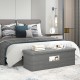 Folding storage ottoman bench in dark gray with padded seat, ideal for bedroom organization and extra seating.