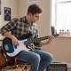 Electric bass guitar in blue with double pickups, featuring a smooth neck and solid wood construction for beginners.