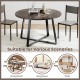 Round 47-inch dining table with a grey wood-grain surface and stable X-shaped base, ideal for dining rooms and living.