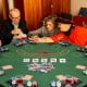 Foldable 48-inch poker table top with cup holders, accommodating 8 players for card games and gatherings.
