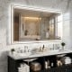 48" x 28" LED bathroom mirror with a sleek design, showcasing frontlit and backlit features in a modern bathroom.