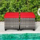Two outdoor rattan ottomans with red removable cushions, perfect for patio or poolside use, featuring durable PE rattan.
