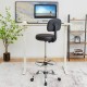 Swivel drafting chair in black with adjustable height, backrest, and footring for ergonomic comfort at desks.