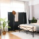 4-panel black room divider with a sturdy steel frame, perfect for creating privacy in living rooms or patios.