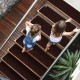 Soft brown slip-resistant stair treads made of durable polyester, ideal for safety and noise reduction on stairs.