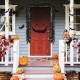 Black pre-lit Halloween garland with 50 purple LED lights, perfect for festive outdoor decoration and creating a spooky.