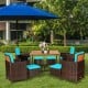 9-piece patio rattan dining set with turquoise cushions, featuring an acacia wood tabletop and umbrella hole for.