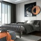 Queen wood platform bed with headboard in a modern bedroom, featuring solid wood frame and under-bed storage space.
